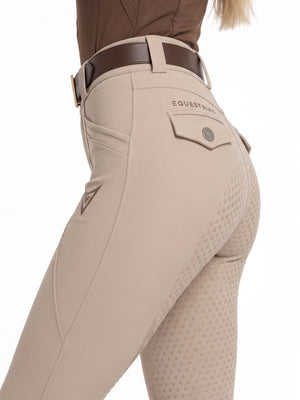 Beige competition breeches, side detail of the decorative back pocket flap, Valerie Equestrian logotype and full seat grip — Valerie Equestrian Impulsion