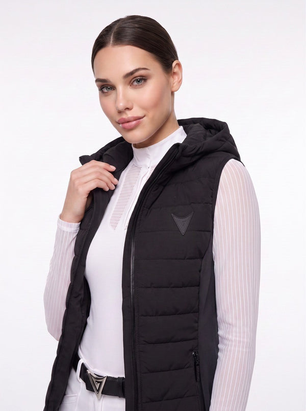 Black hooded riding gilet on model, close-up — Valerie Equestrian Assurance