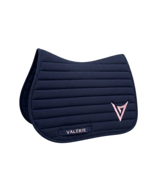 Navy nylon jumping saddle pad with pink logo, studio — Valerie Equestrian Devotion