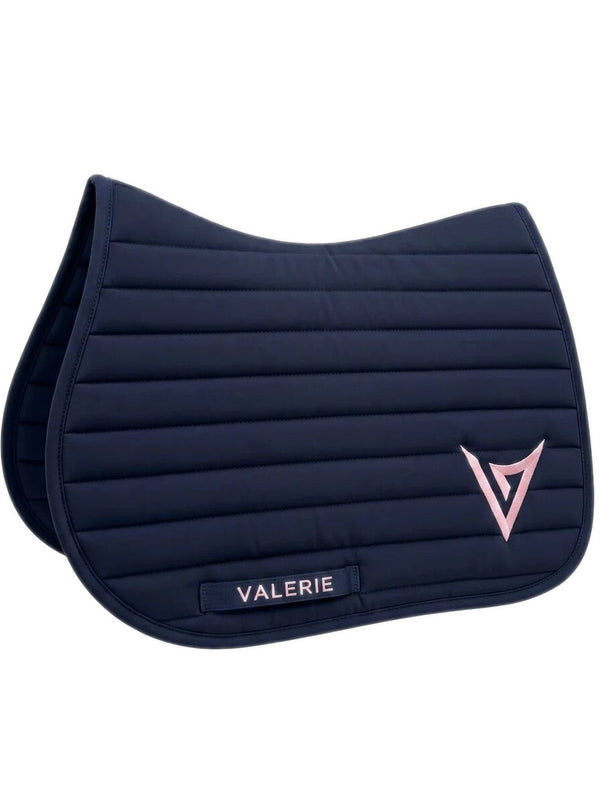 Navy nylon jumping saddle pad with pink logo, studio — Valerie Equestrian Devotion