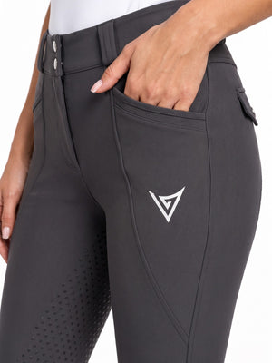 Rider in graphite grey full-seat riding breeches outdoors — Valerie Equestrian Momentum