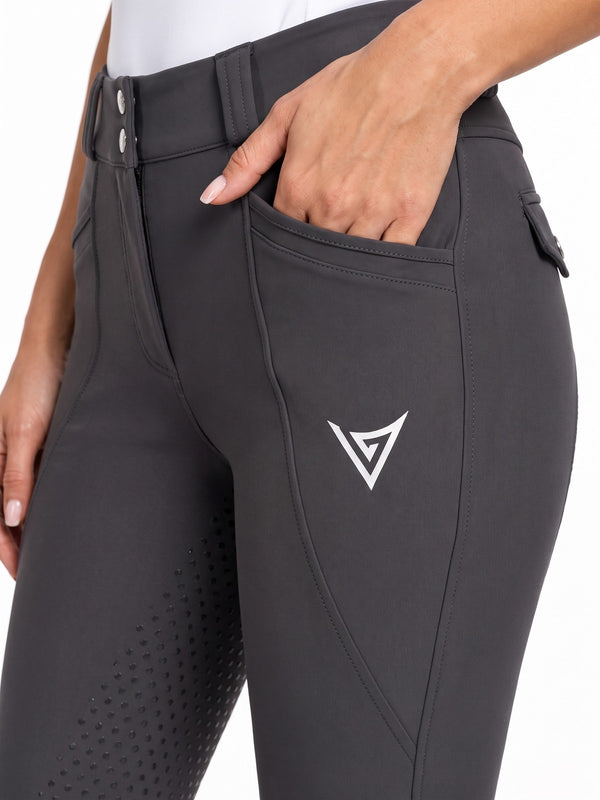 Rider in graphite grey full-seat riding breeches outdoors — Valerie Equestrian Momentum