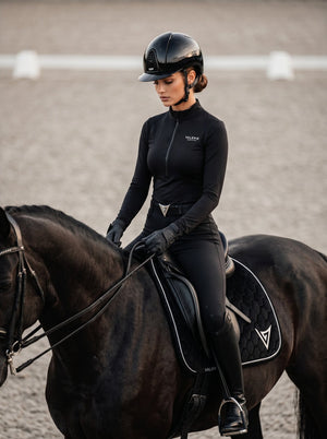 Black velvet saddle pad, lifestyle — Valerie Equestrian