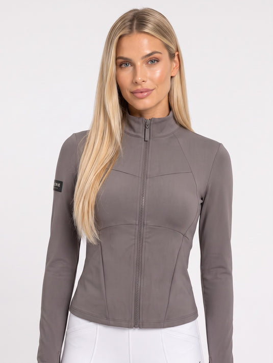 Warm grey full-zip riding rashguard with stand collar and shaping seams, front view — Valerie Equestrian Agility