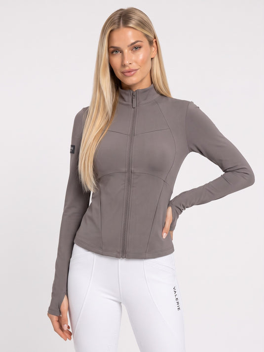 Warm grey full-zip riding rashguard with stand collar and shaping seams, front view — Valerie Equestrian Agility